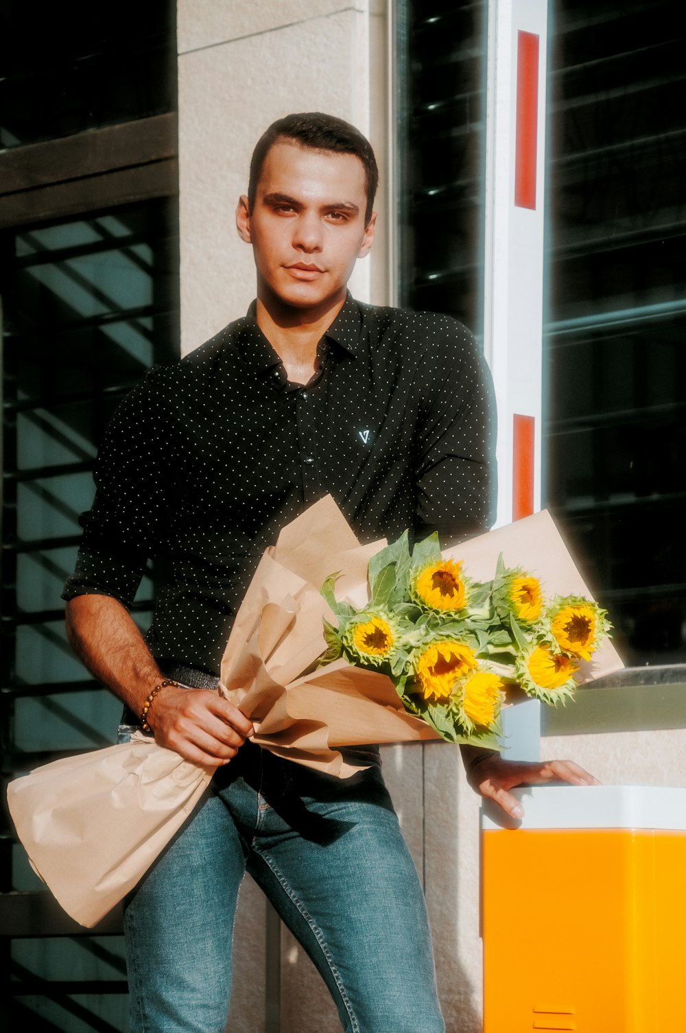 a person holding a bouquet of flowers