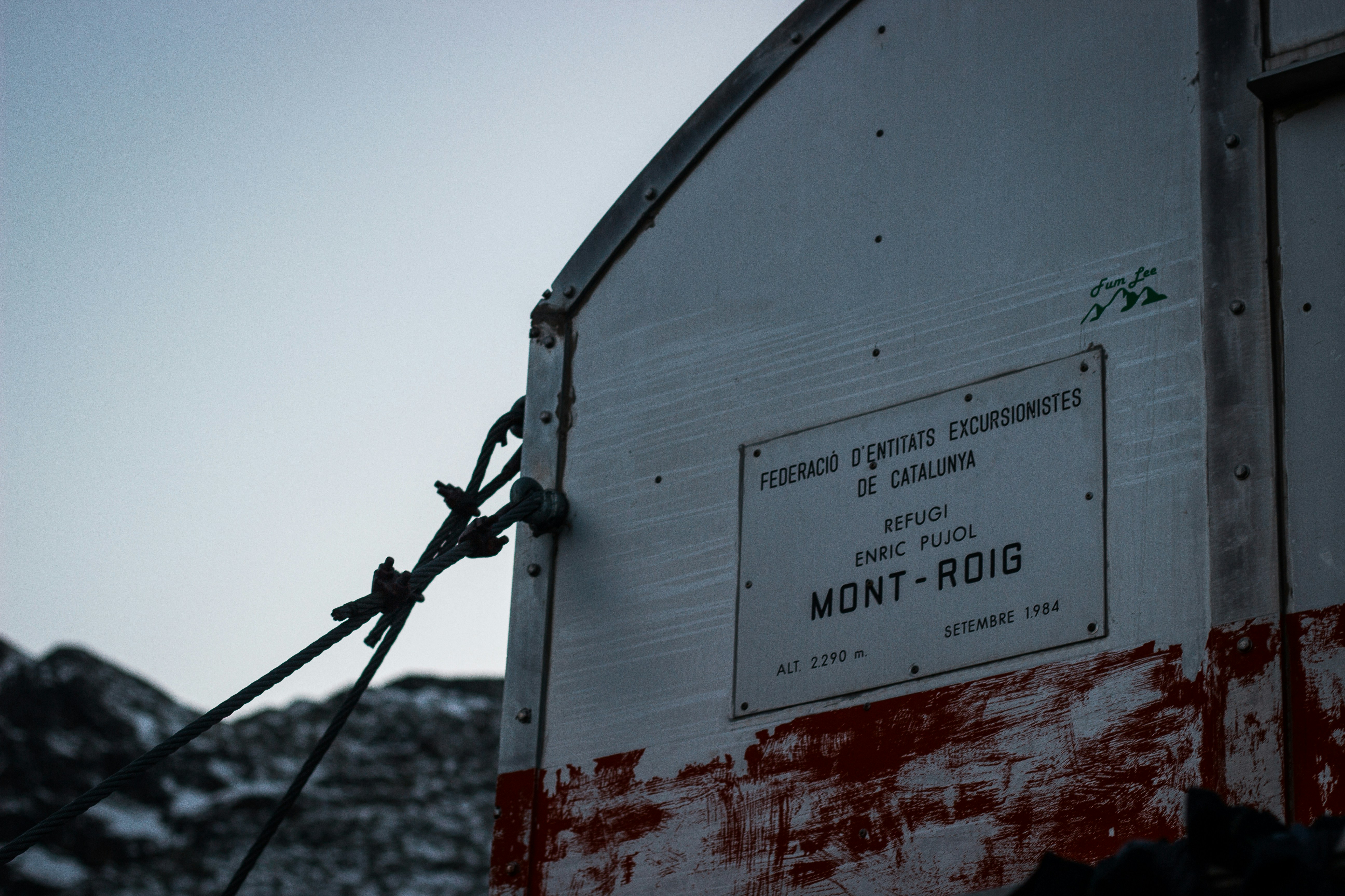 A sign on a building photo – Free Pyrenees Image on Unsplash
