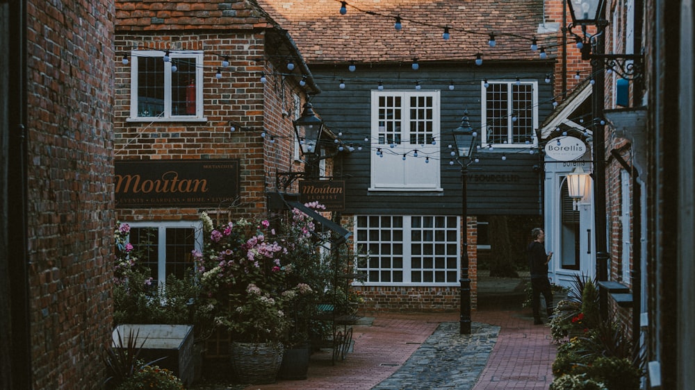 a brick building with a sign on it