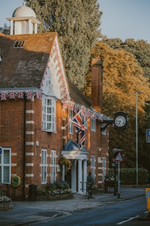 a clock on a brick building