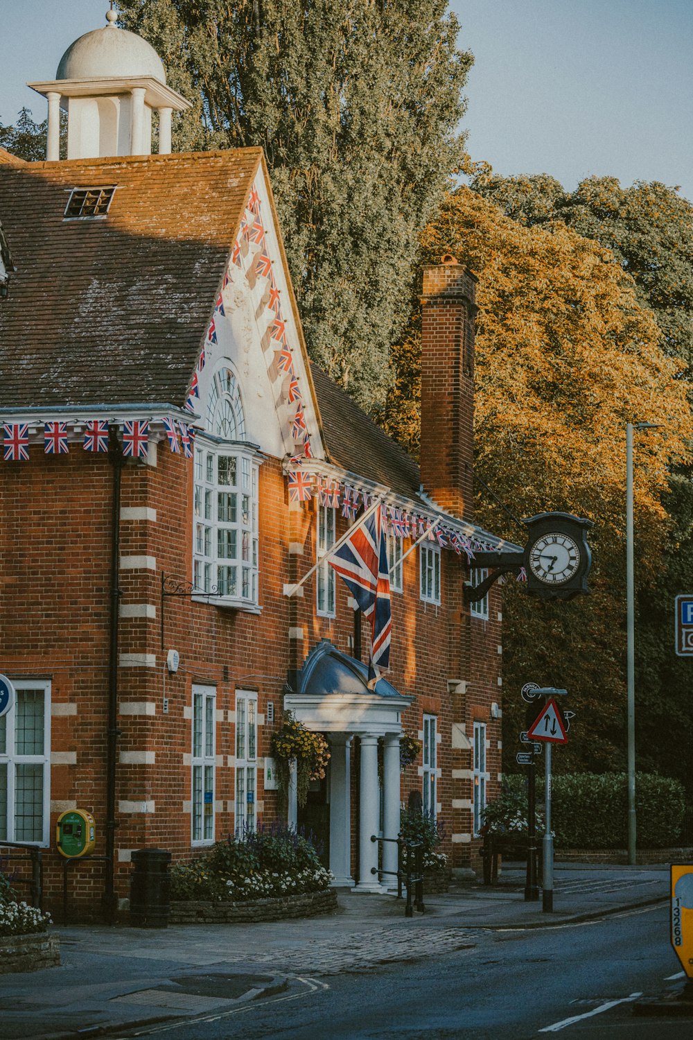 a clock on a brick building