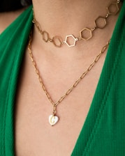 a necklace on a person's neck