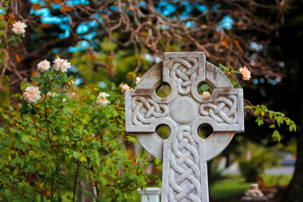 a white cross with a face on it