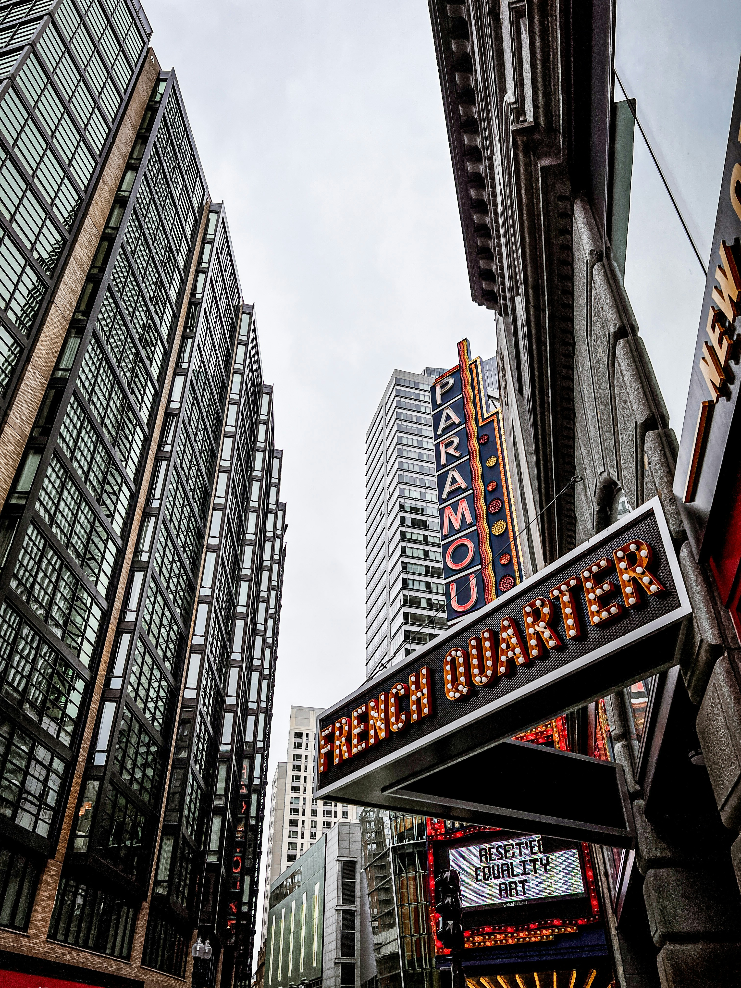 a city street with tall buildings