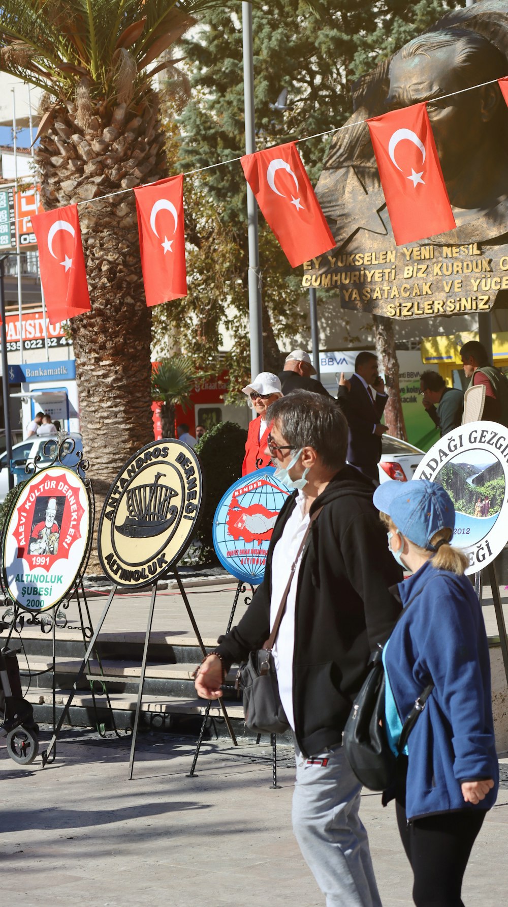 a group of people holding signs