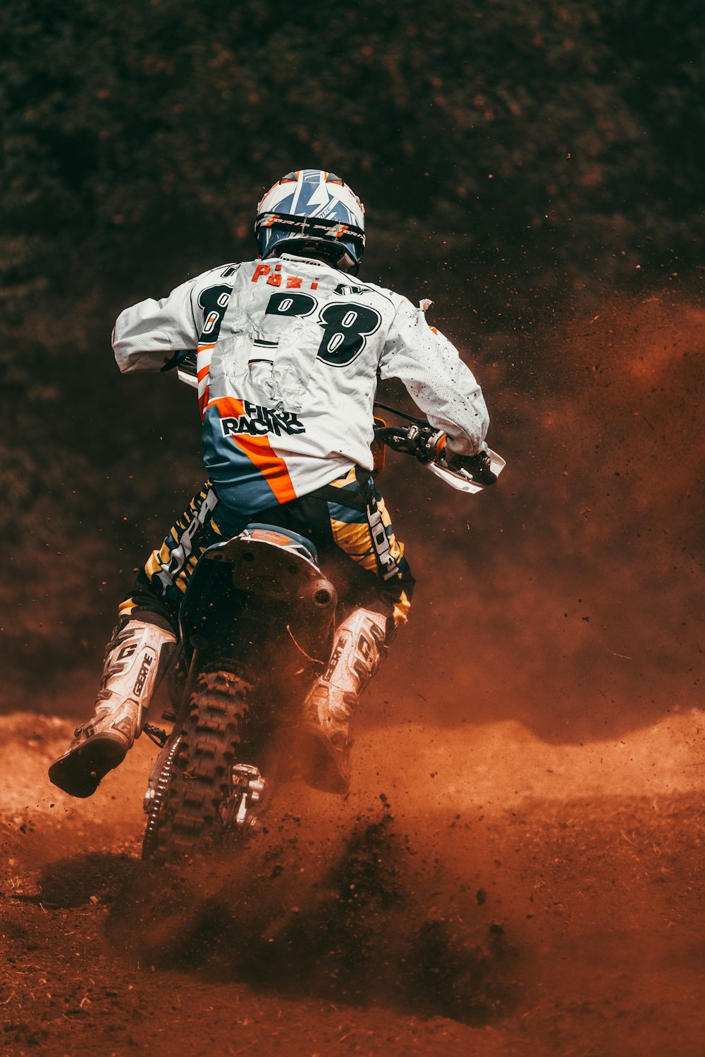 a man riding a dirt bike