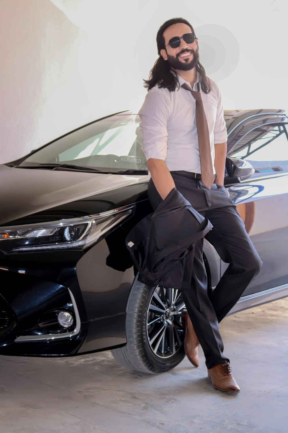 a person sitting on a car