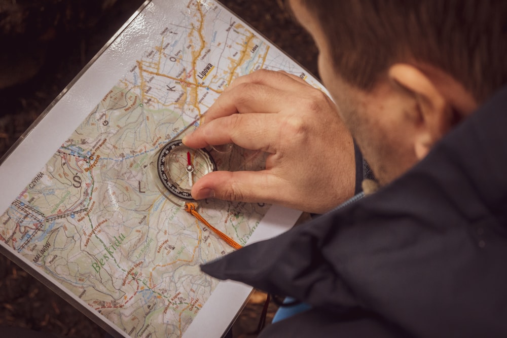 a man holding a magnifying glass