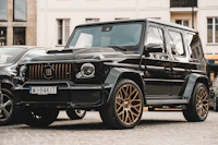 a black car parked on a street