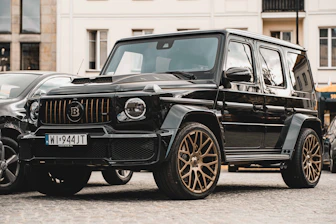 a black car parked on a street