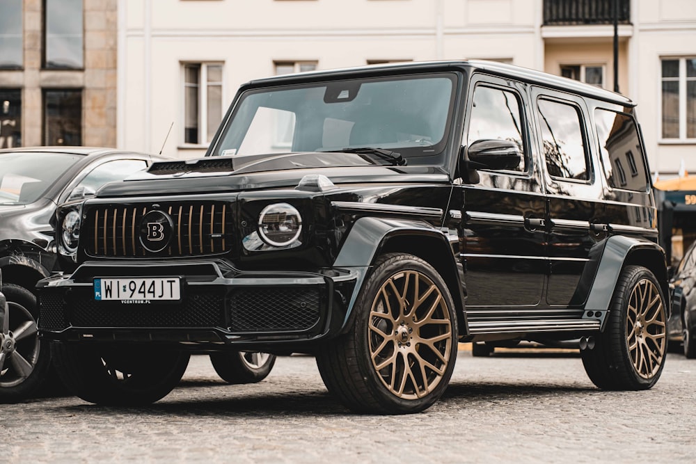 a black car parked on a street