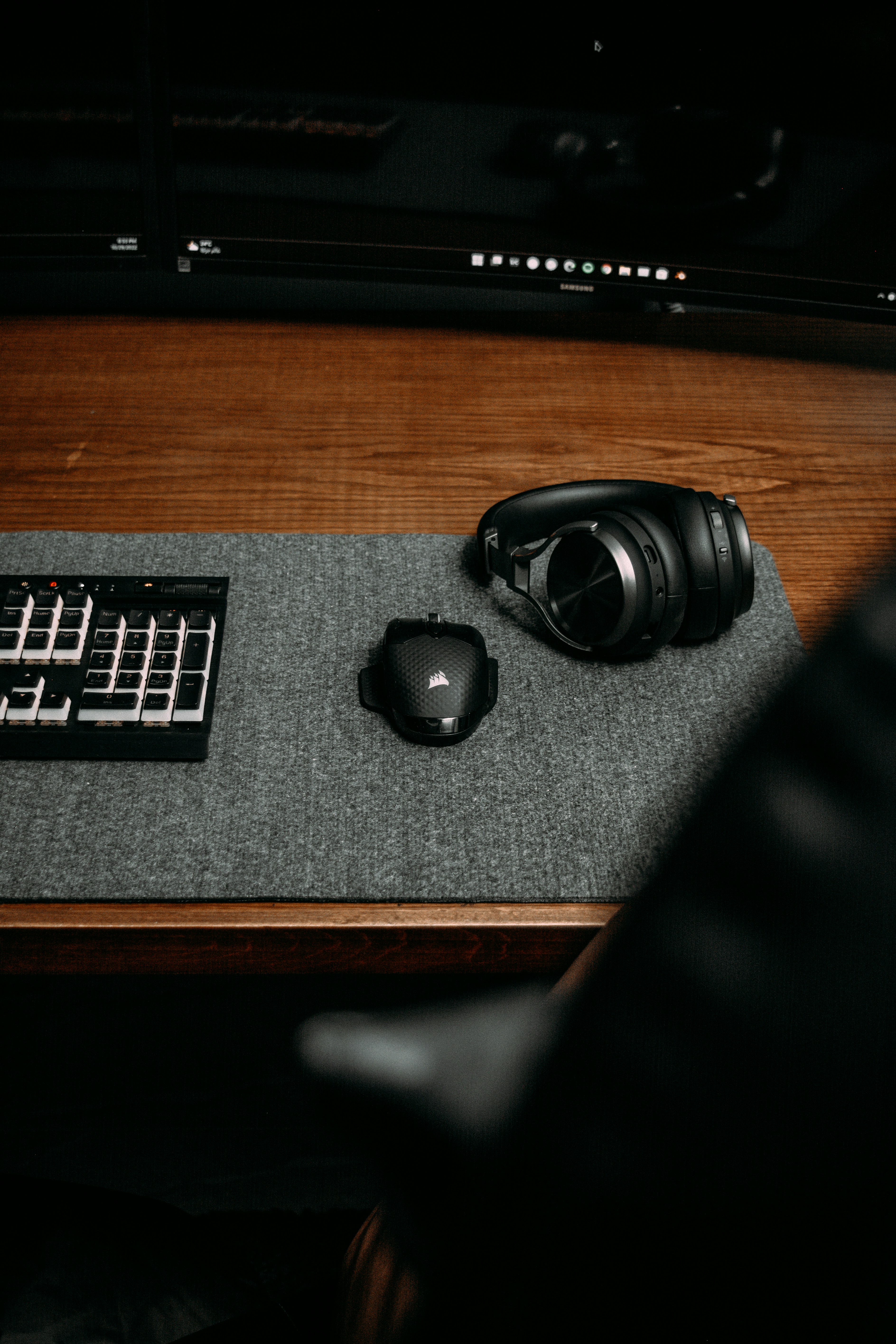 a black headphones on a black surface