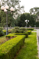 a garden with a lamp post