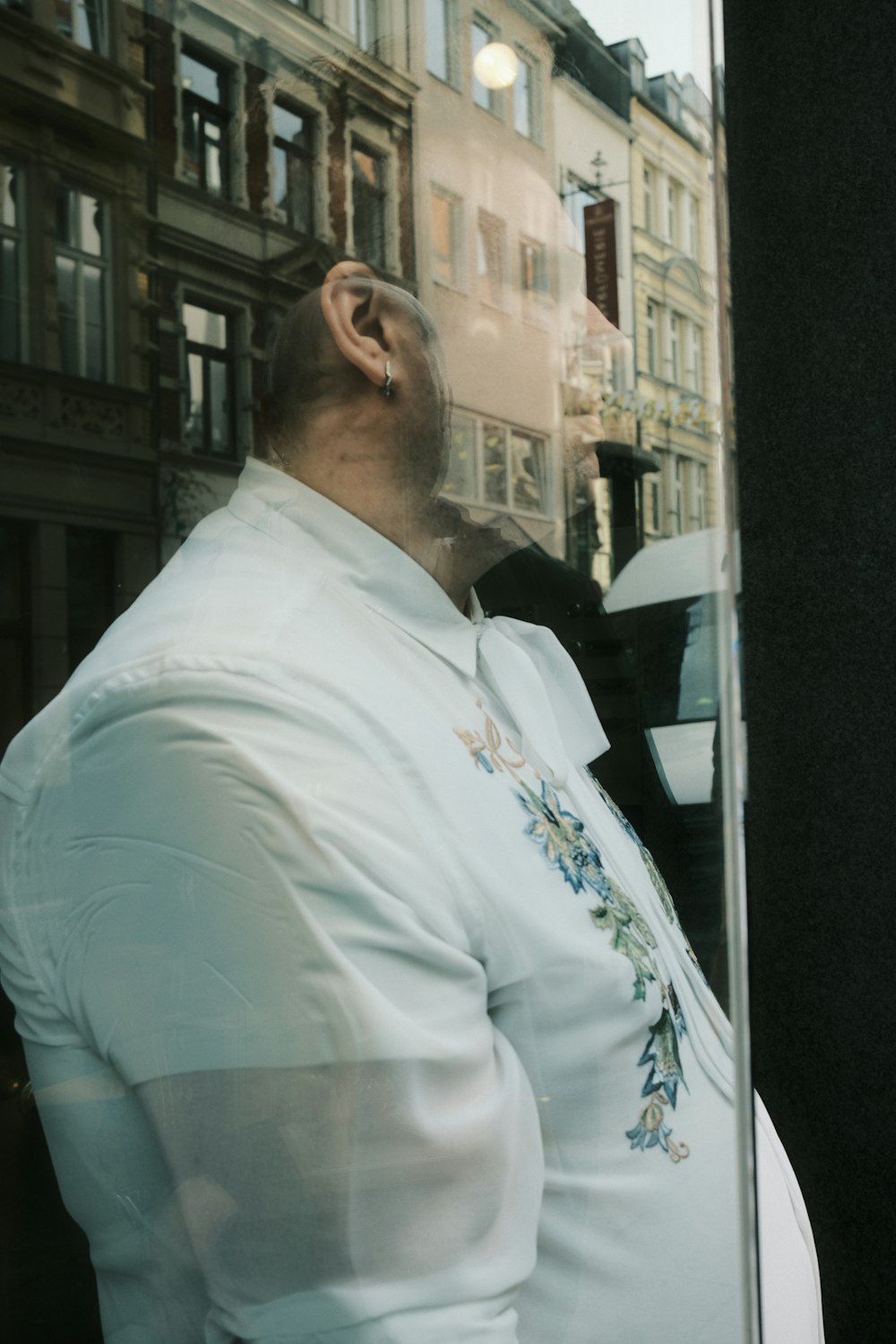 a man wearing a white shirt