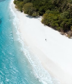 a person surfing on the waves