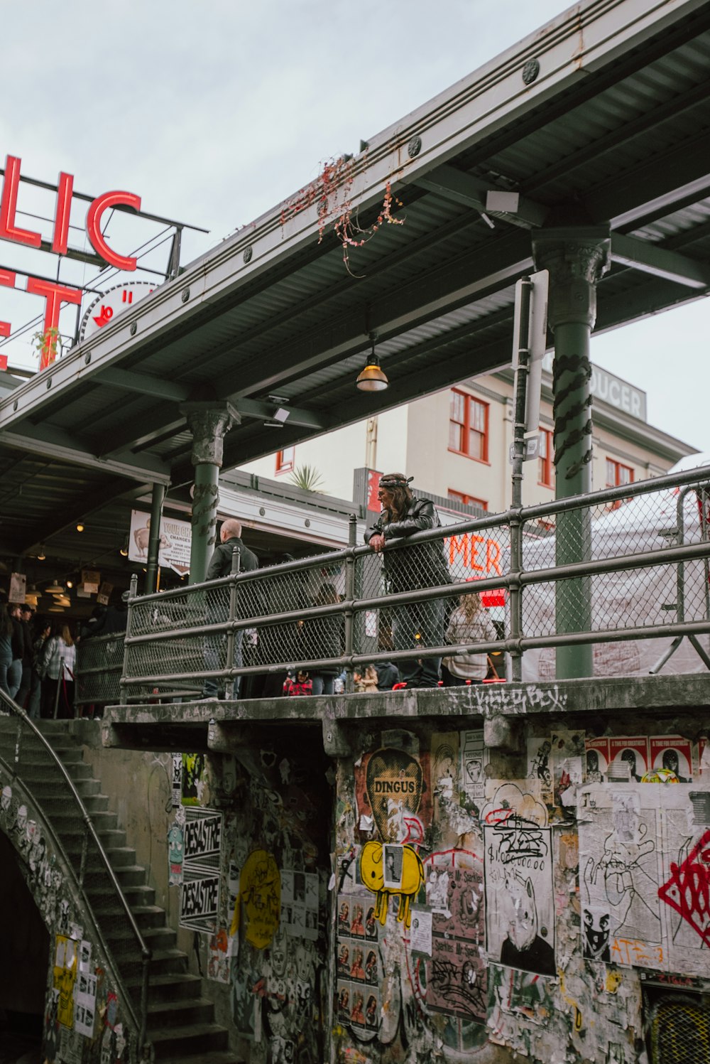 a group of people on a bridge