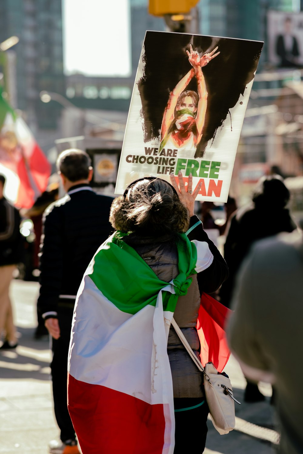 a person holding a sign