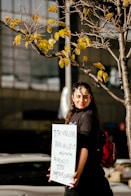 a person holding a sign