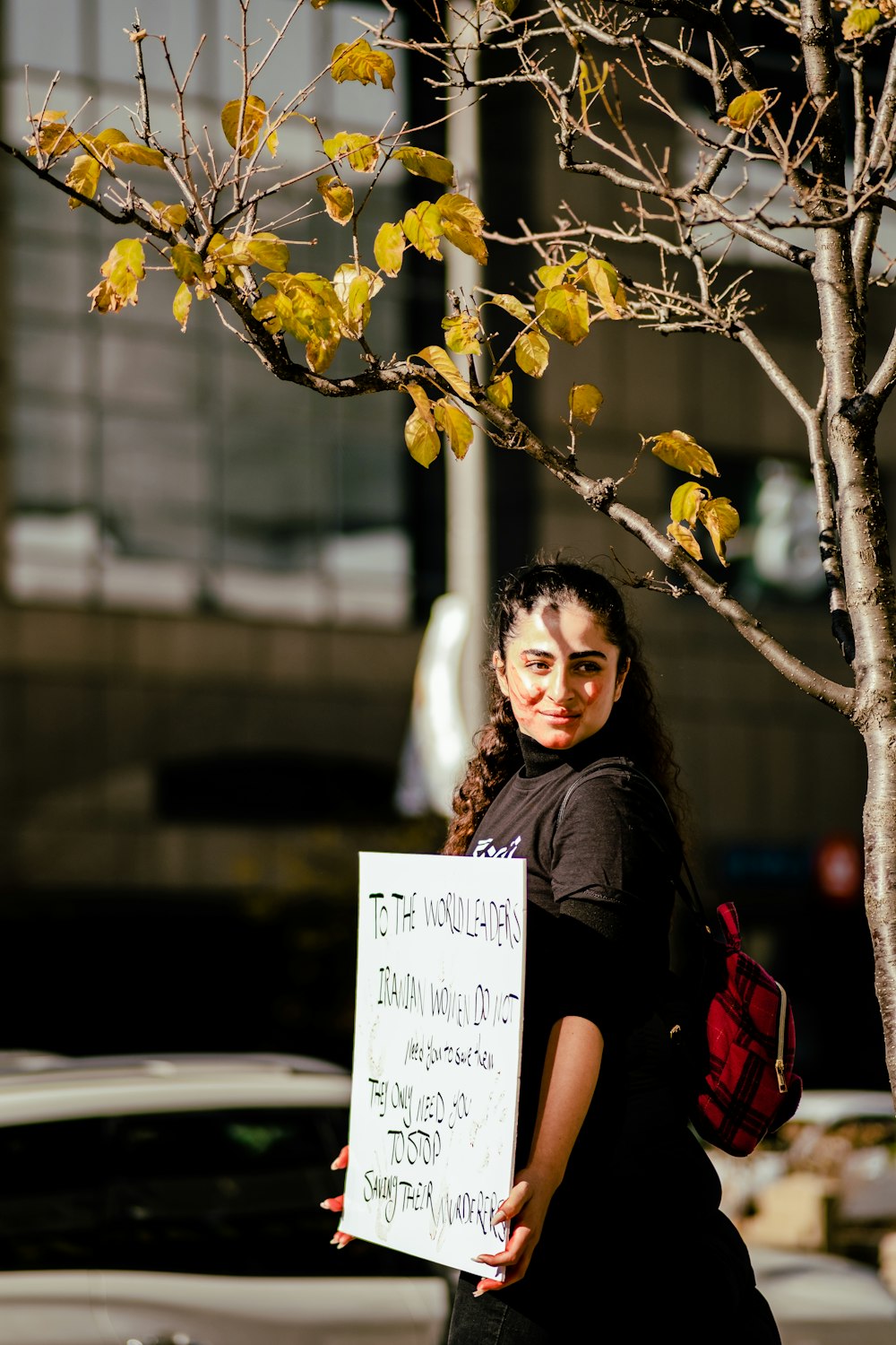 a person holding a sign