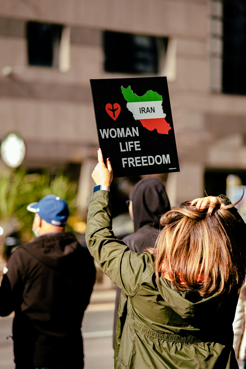 a person holding a sign