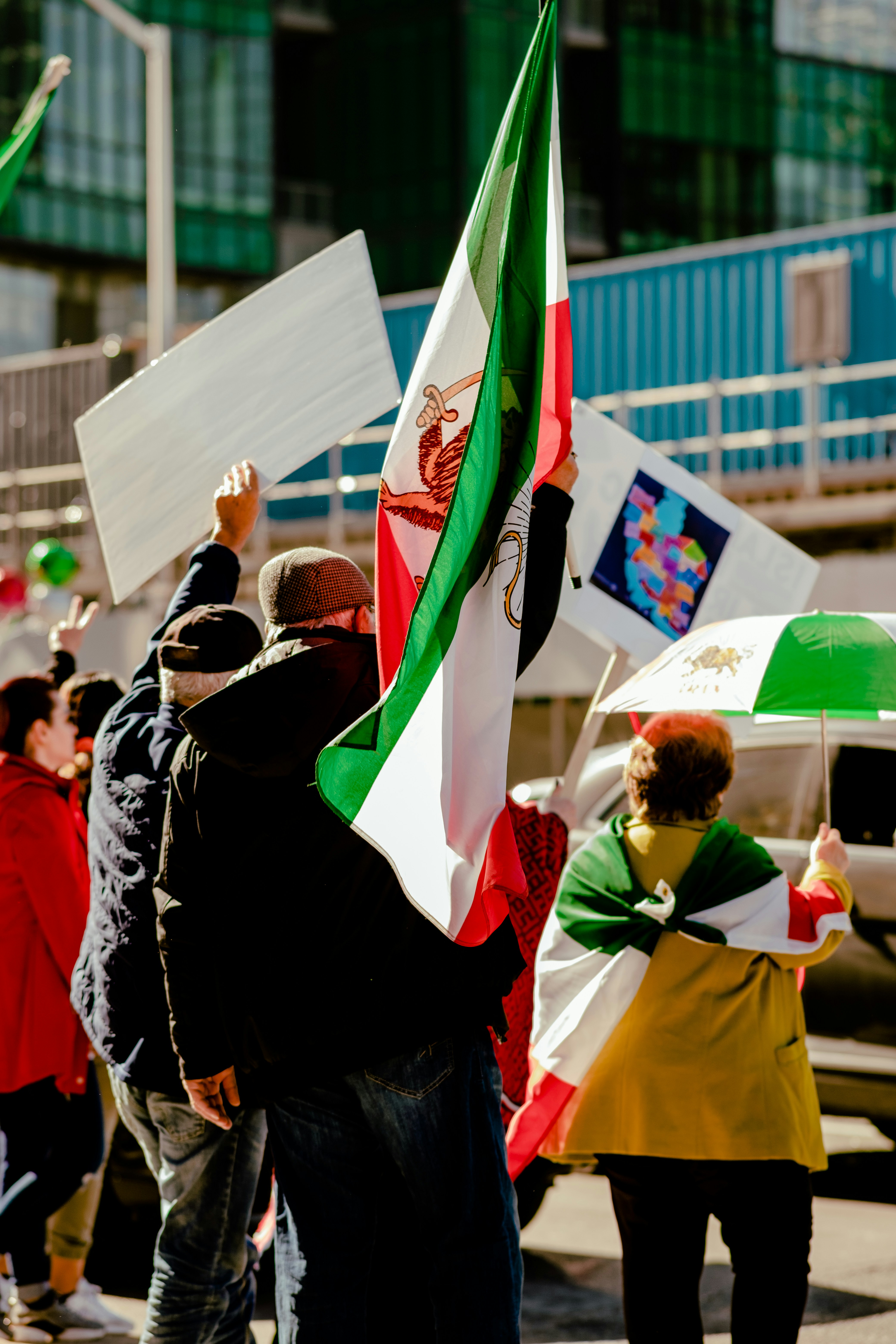 a group of people holding flags