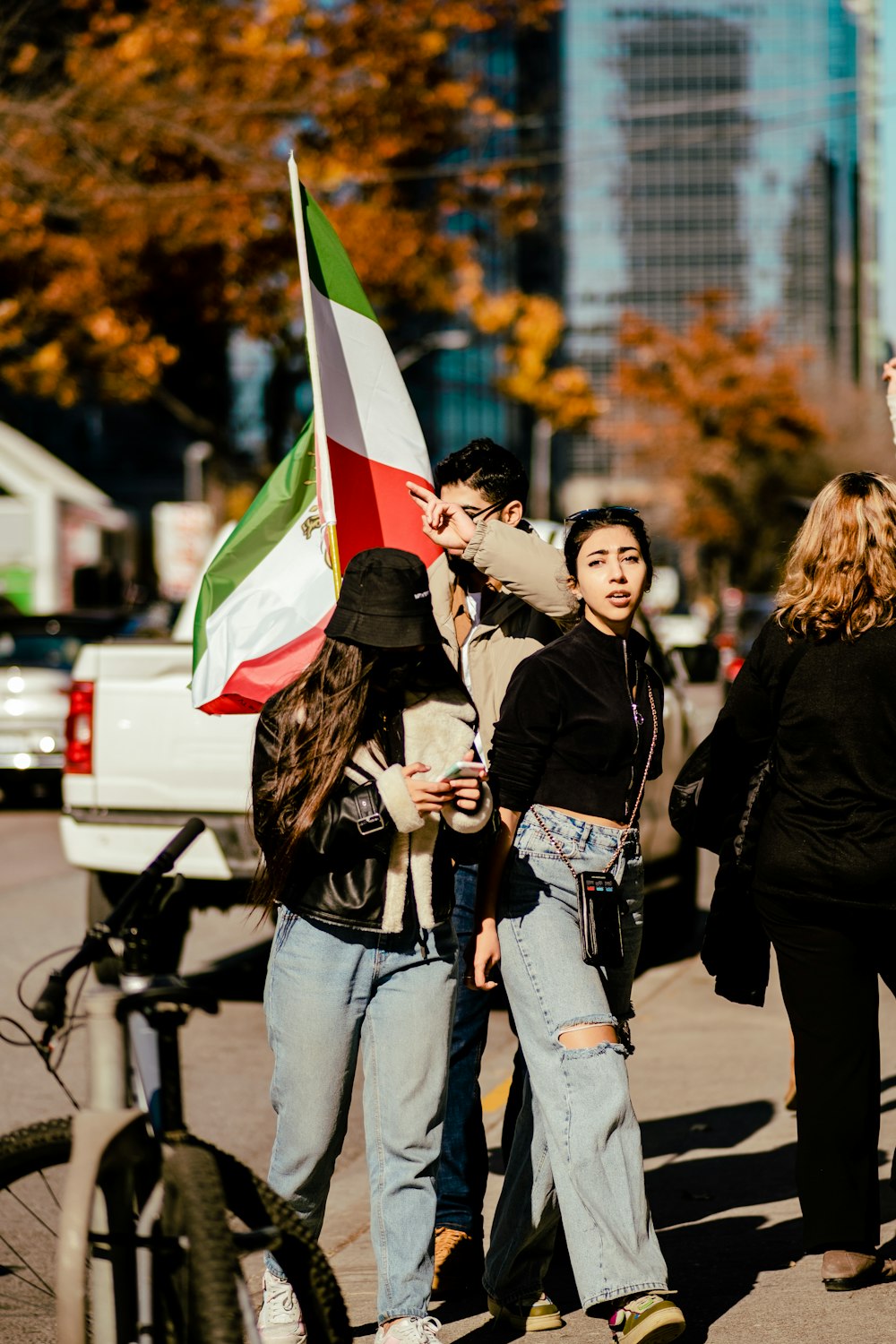 a group of people holding a flag