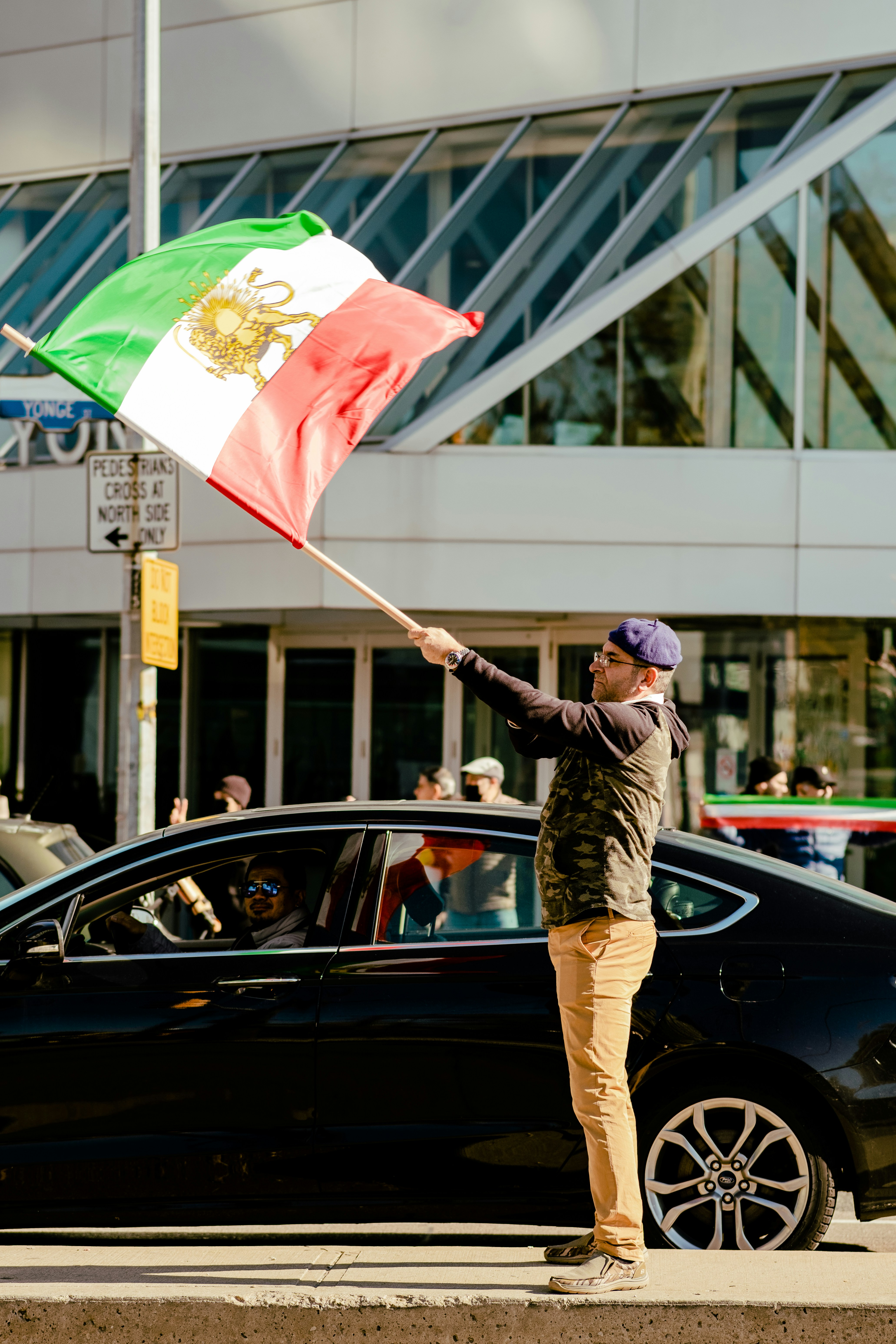a man holding a flag