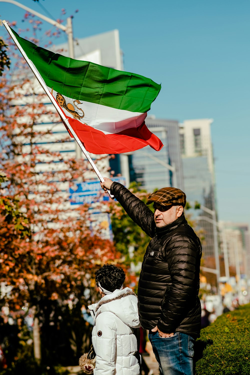 a man holding a flag