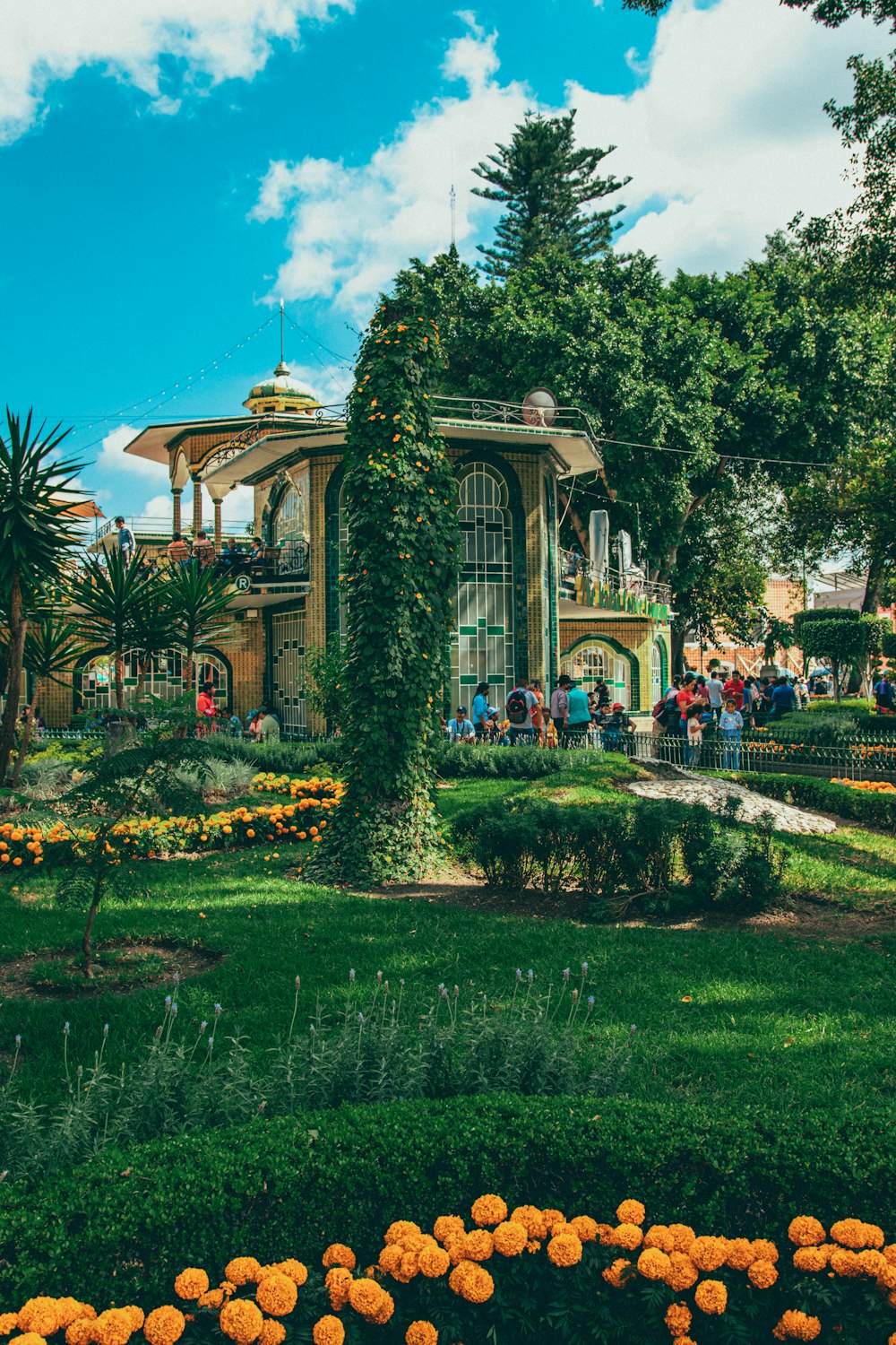 a building with a large garden in front of it