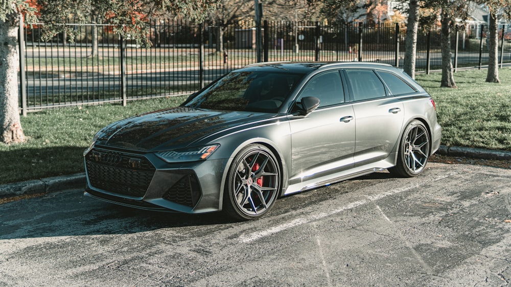 a silver car parked on a street