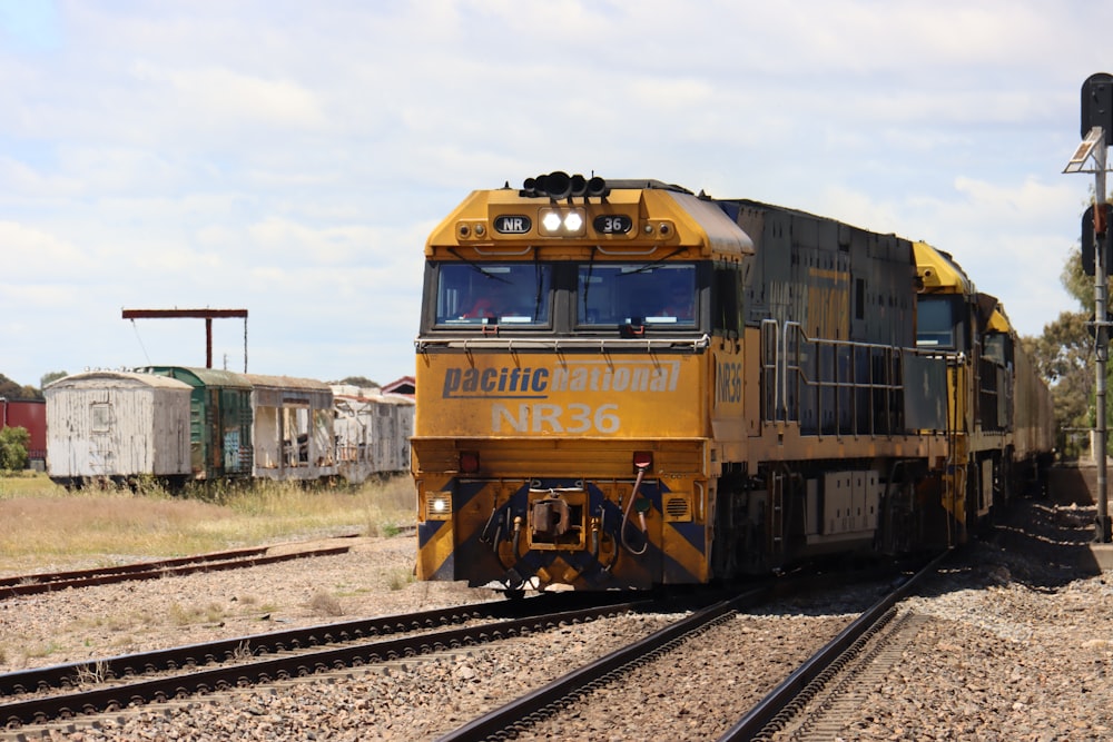 a train travels down the tracks