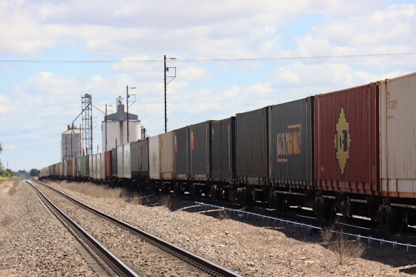 a train travels down the tracks