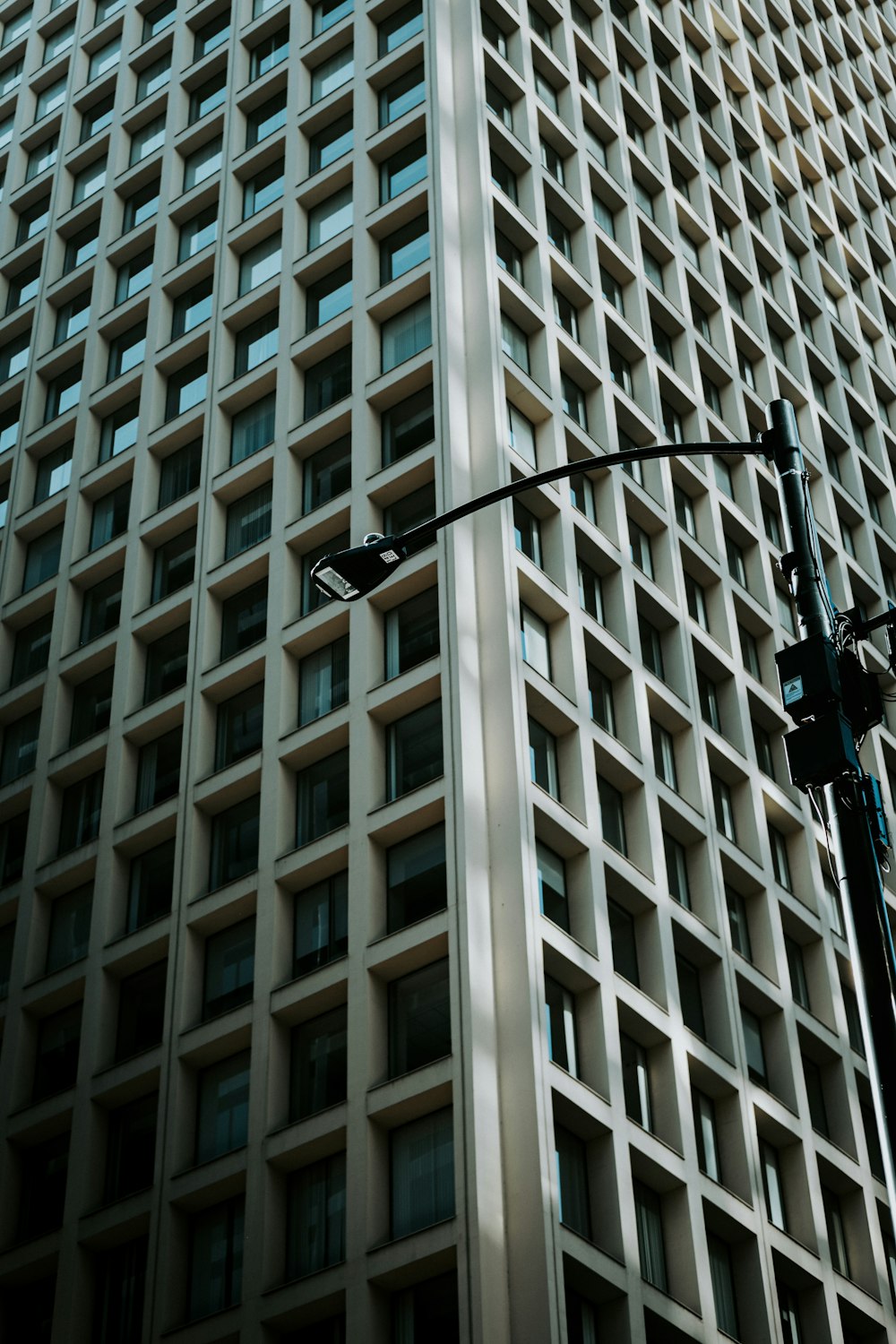 a tall building with a street light