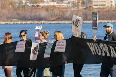 A group conducting a peaceful protest to highlight rights violations.