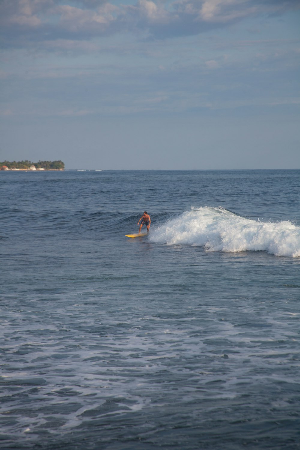 a person surfing on the sea