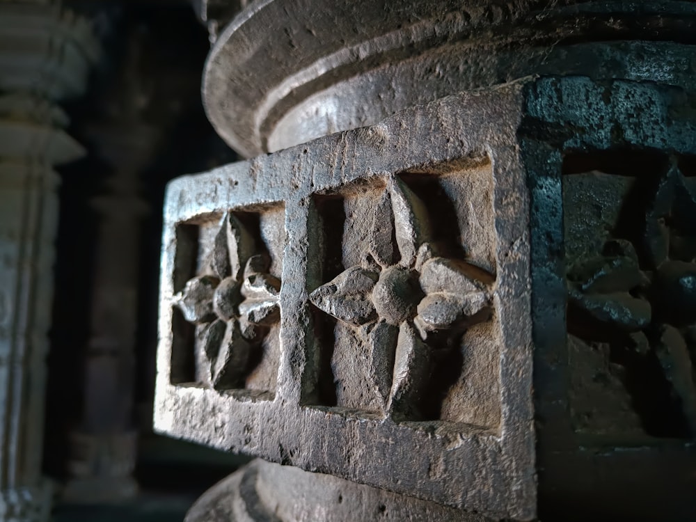 a stone carving of a man and a woman