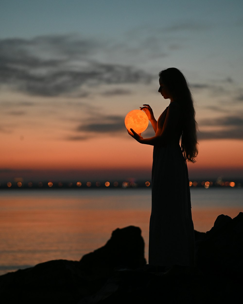 a man holding a pumpkin