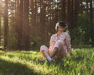 a person sitting in the grass