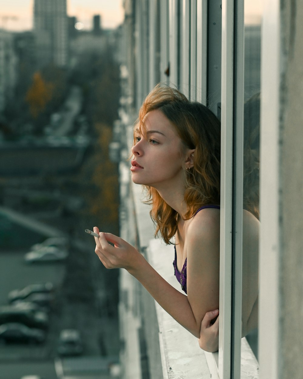 a woman smoking a cigarette