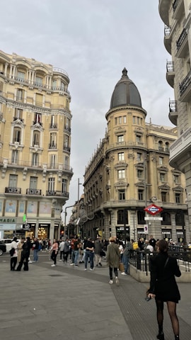 A vibrant cityscape of a European capital bustling with innovation and diverse people.