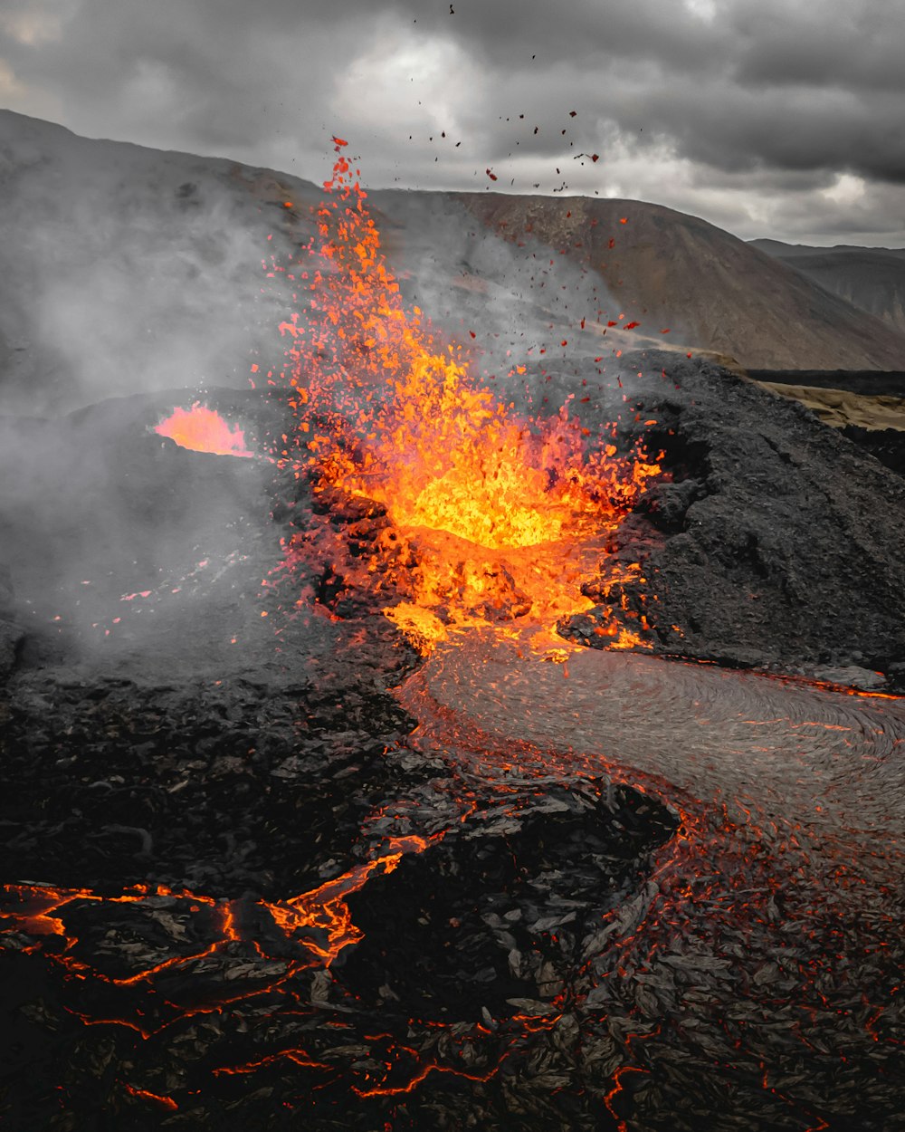 a volcano erupting with lava