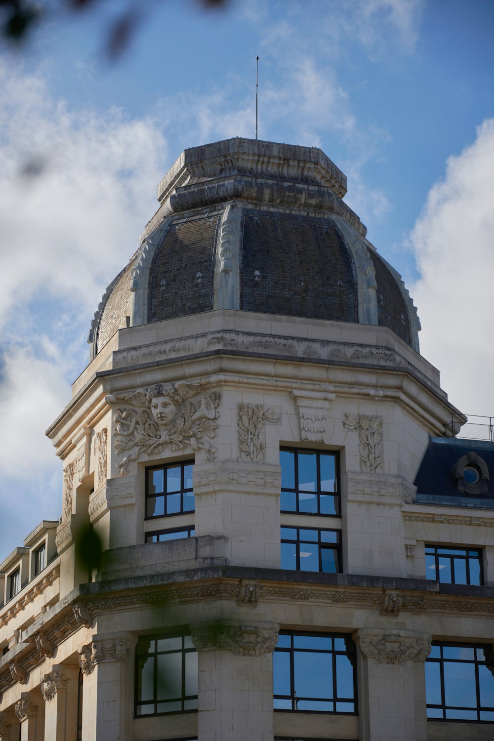 a building with a dome and windows