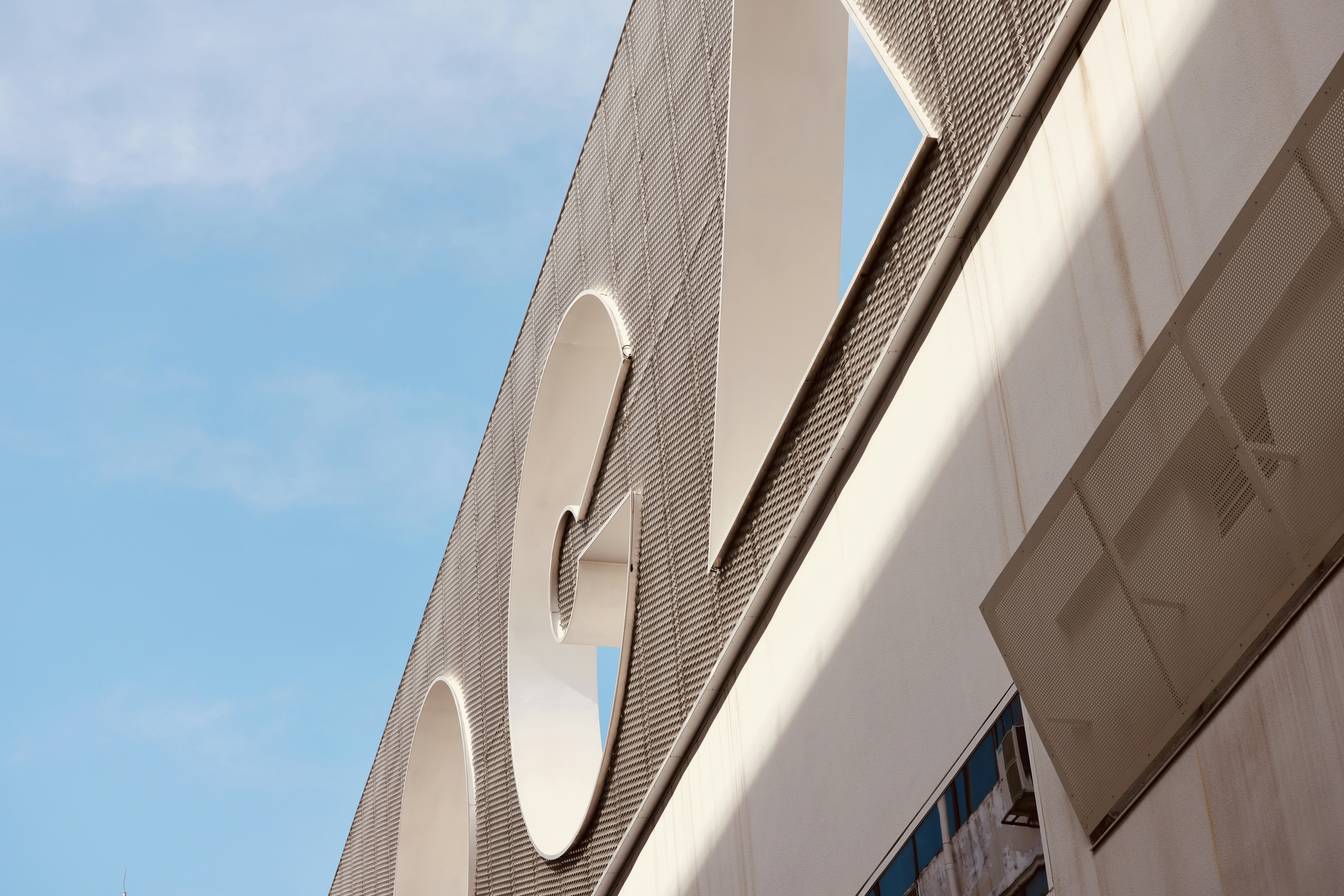 a building with a curved roof