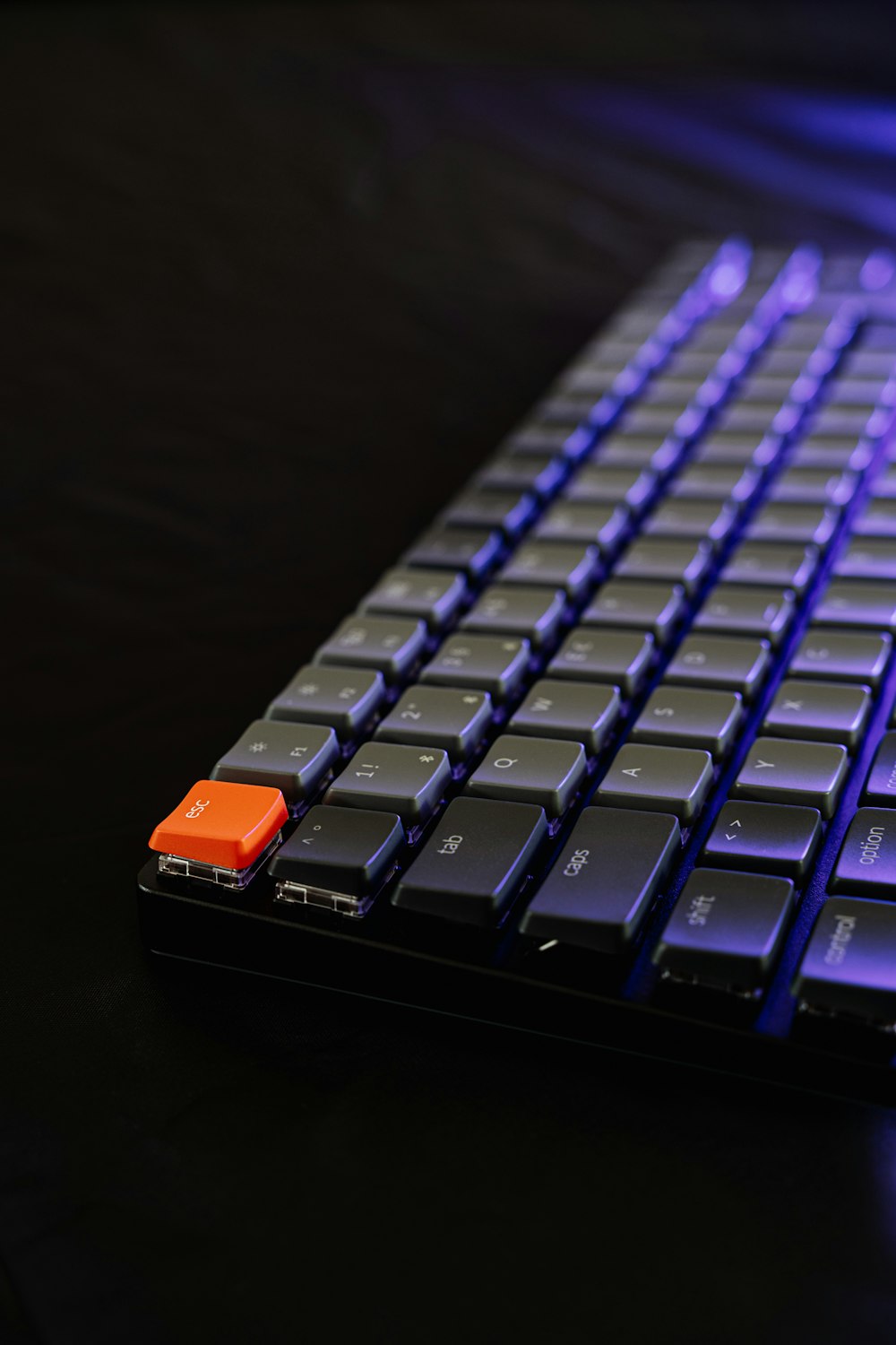 a keyboard with a blue light