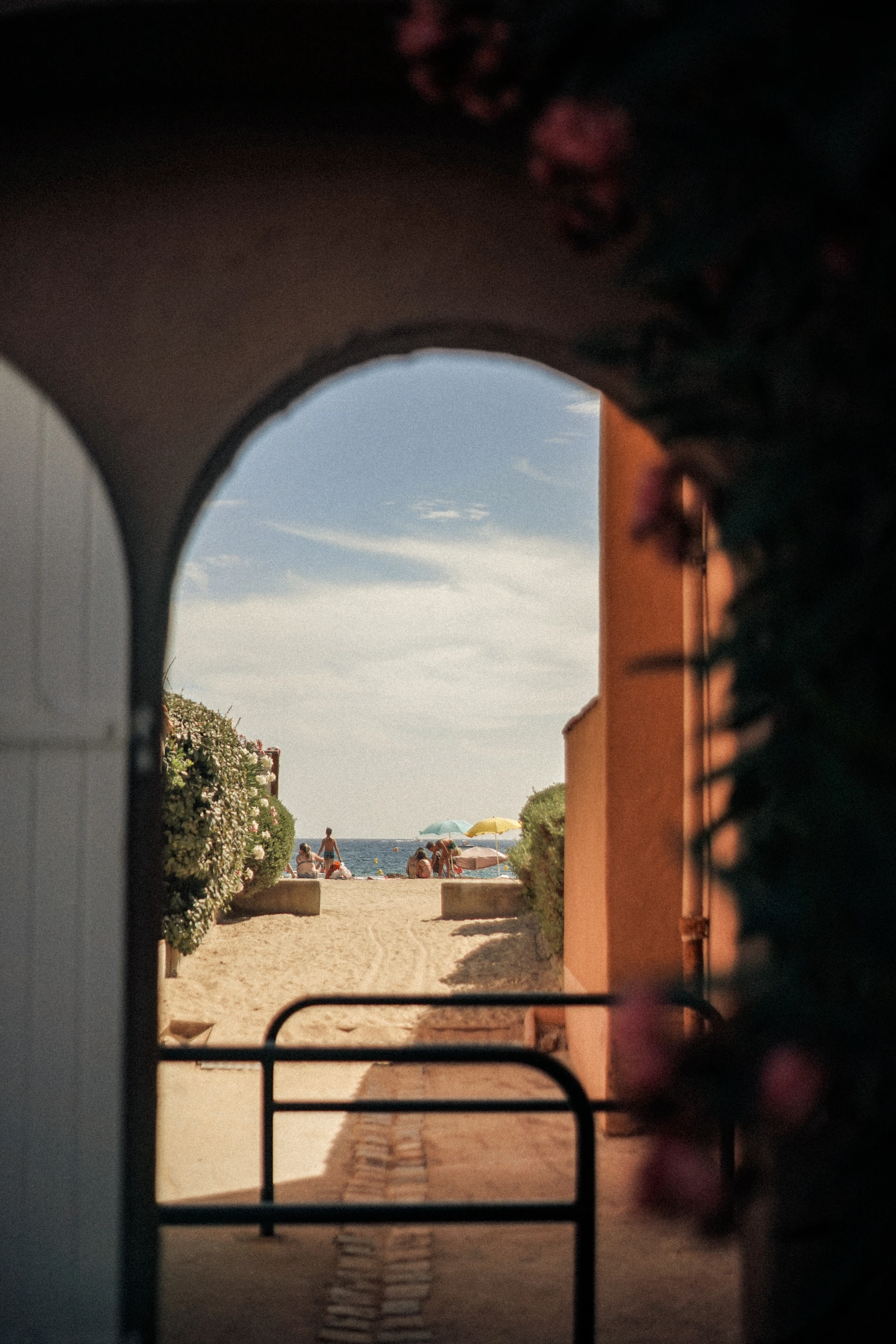 a view of the beach through a window
