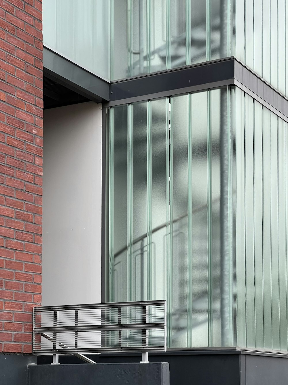 a metal gate in front of a building