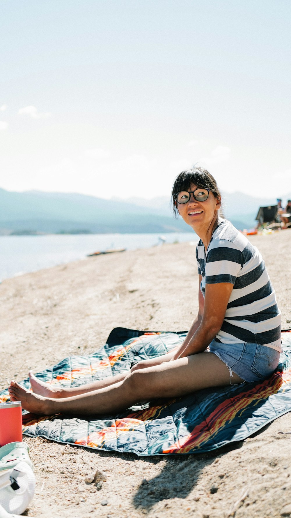 a man sitting on a beach