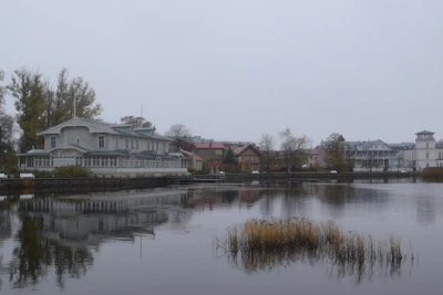Reeds and wooden villas along the still water of Haapsalu bay
