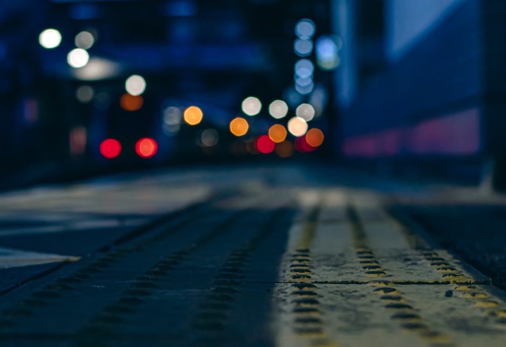 a blurry view of a city street at night