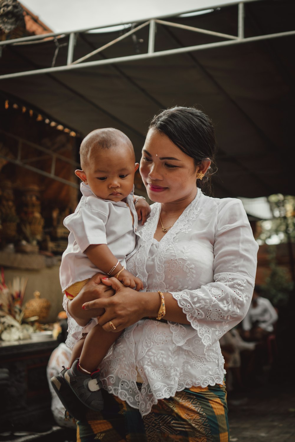 a person holding a baby